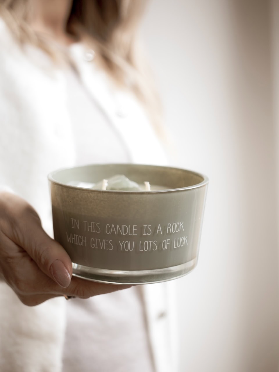 In this candle is a rock which gives you lots of luck.